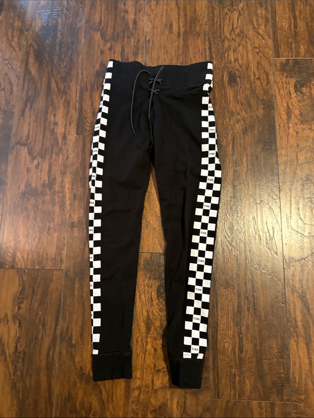 Victoria’s Secret pink Black Joggers with White Checkerboard Side Stripes
